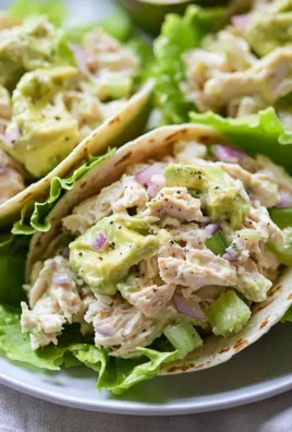 Avocado Chicken Salad Wraps with fresh ingredients wrapped in lettuce