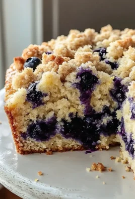 Delicious Blueberry Lemon Crumb Cake with a crumbly topping and fresh blueberries