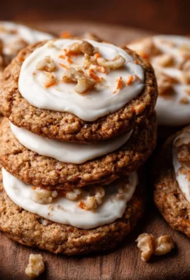 Close-up of chewy carrot cake cookies with cream cheese frosting