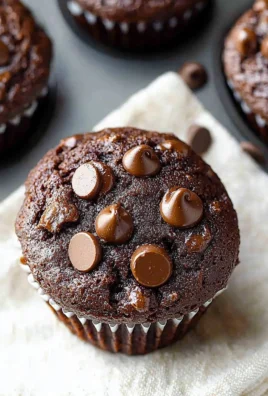 Delicious double chocolate muffins fresh out of the oven.