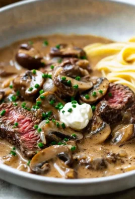 Plate of Gordon Ramsay's Beef Stroganoff garnished with parsley