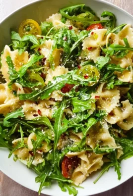 Delicious Lemon Arugula Pasta Salad served in a bowl