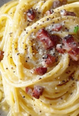 Delicious Spaghetti Carbonara with creamy sauce and crispy pancetta