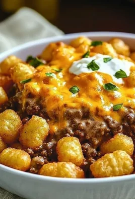 Tater Tot Casserole topped with golden tater tots and ground beef