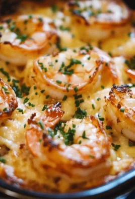 Delicious baked stuffed shrimp casserole topped with breadcrumbs and herbs