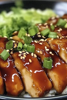 Delicious teriyaki chicken served on a plate with vegetables and rice