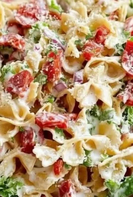 Delicious BLT Pasta Salad with bacon, lettuce, tomato, and pasta in a bowl