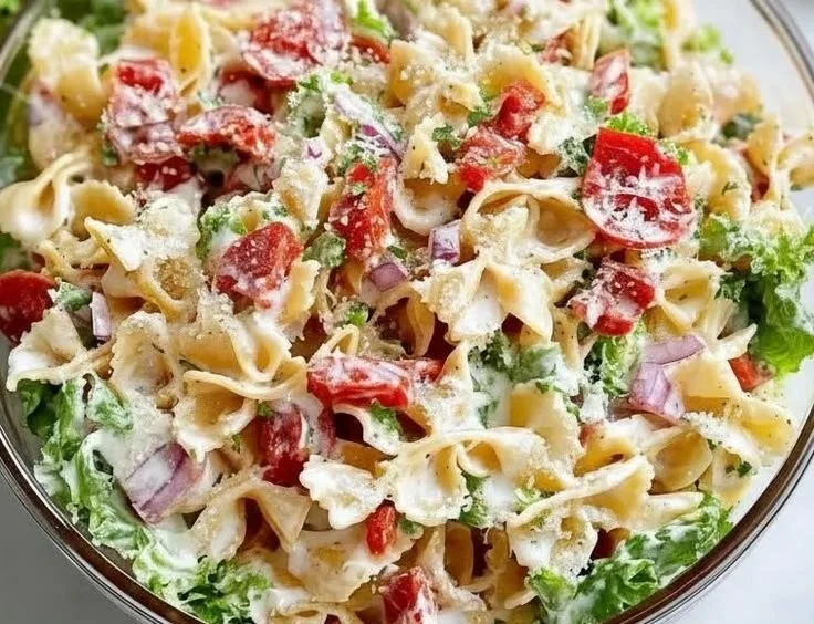 Delicious BLT Pasta Salad with bacon, lettuce, tomato, and pasta in a bowl