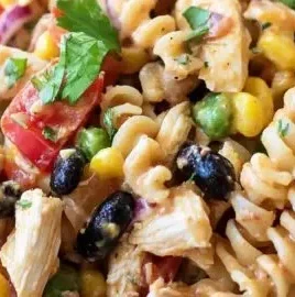 Bowl of Southwest Chicken Pasta Salad with colorful vegetables and chicken