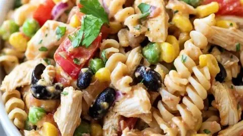 Bowl of Southwest Chicken Pasta Salad with colorful vegetables and chicken