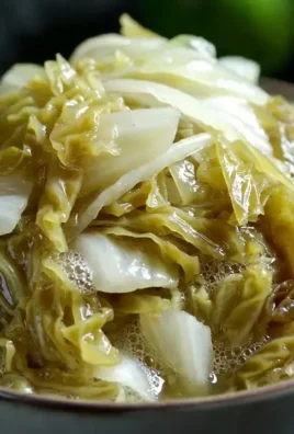 Bowl of homemade fermented cabbage ready to serve with toppings