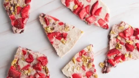 Delicious frozen yogurt bark topped with fresh berries
