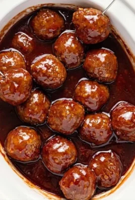 Delicious Grape Jelly Meatballs served on a platter for a party appetizer