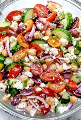 Delicious Greek Chickpea Salad with vegetables and feta cheese