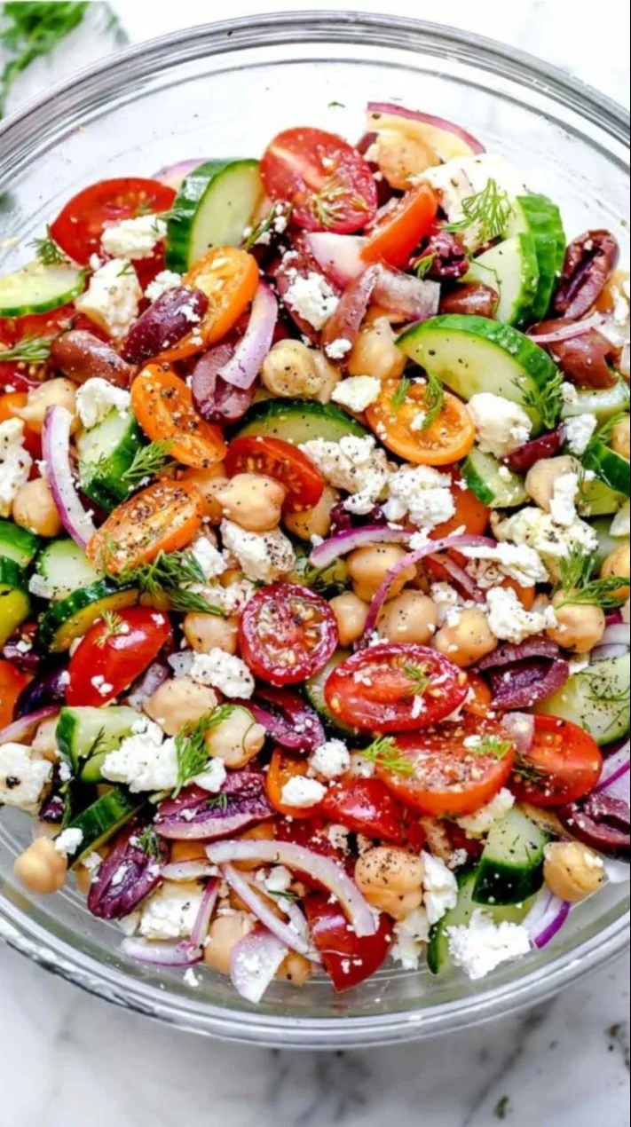 Delicious Greek Chickpea Salad with vegetables and feta cheese