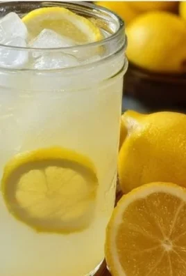 Refreshing homemade lemonade served in a glass with lemon slices