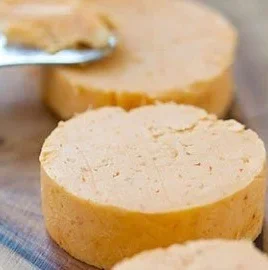 Delicious homemade honey sriracha butter spread on bread