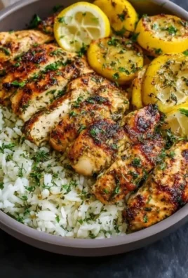Lemon Garlic Chicken Meal Prep Bowl with vegetables and rice