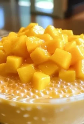 Delicious Mango Sago dessert with mango puree and tapioca pearls