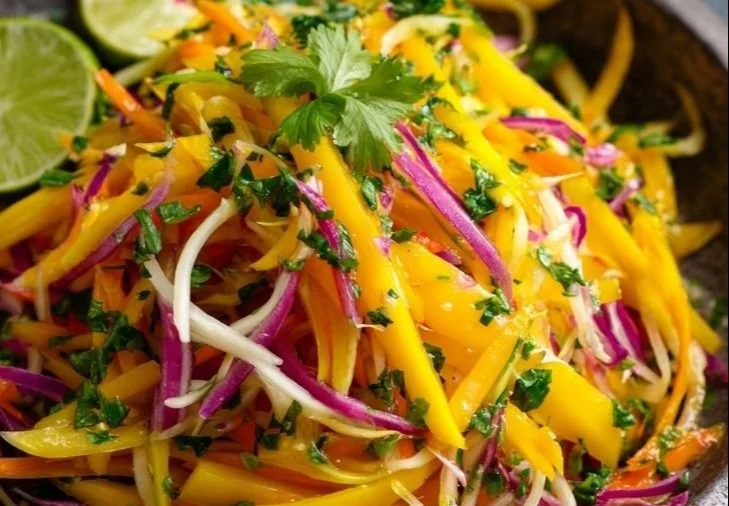 Colorful Mango Slaw with fresh veggies and zesty dressing
