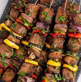 Juicy marinated beef kabobs skewered with vegetables and grilled to perfection