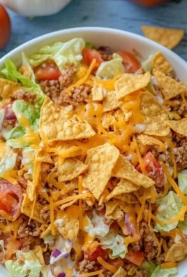 Simple Doritos Taco Salad with colorful ingredients in a bowl