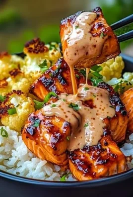 Sriracha Honey Salmon Bowl with vegetables and rice