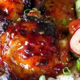 Air fryer sticky sweet chili chicken thighs ready to serve.