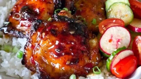 Air fryer sticky sweet chili chicken thighs ready to serve.