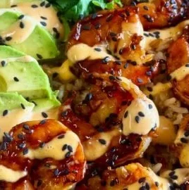 Delicious Teriyaki Shrimp Rice Bowls served in a bowl with vibrant vegetables.