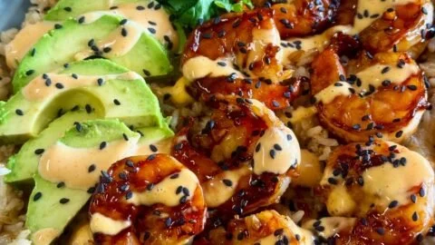 Delicious Teriyaki Shrimp Rice Bowls served in a bowl with vibrant vegetables.