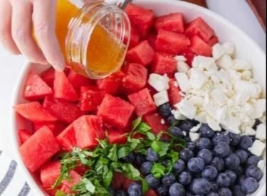 Delicious Watermelon Blueberry Feta Salad served in a bowl with fresh ingredients