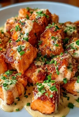 Crispy Bang Bang Salmon Bites served with a spicy dipping sauce