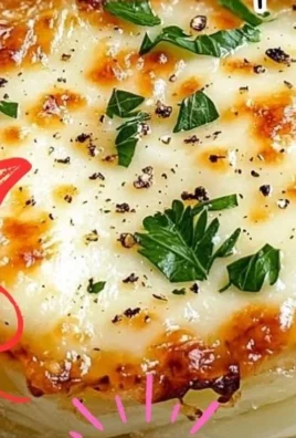 Crispy cheesy cabbage steaks topped with melted cheese and herbs.