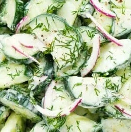 Fresh Cucumber Dill Salad with sliced cucumbers and dill in a bowl