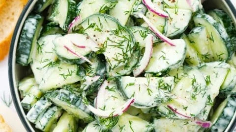 Fresh Cucumber Dill Salad with sliced cucumbers and dill in a bowl