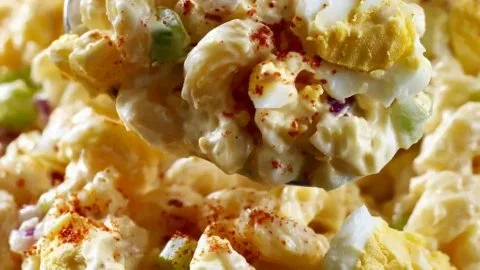 Creamy Deviled Egg Macaroni Salad in a bowl, ready for a picnic