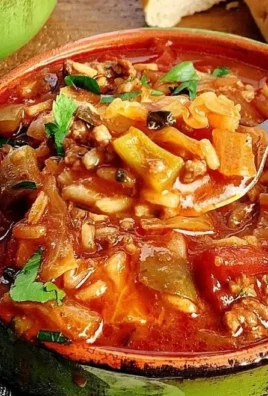 Bowl of easy stuffed cabbage soup with fresh ingredients and herbs