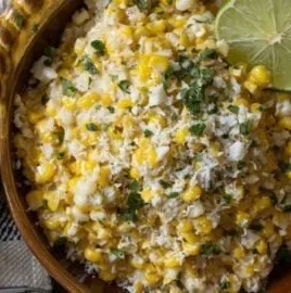 Delicious elote, Mexican street corn topped with cheese and spices.