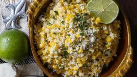Delicious elote, Mexican street corn topped with cheese and spices.