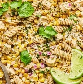 Delicious High Protein Street Corn Pasta Salad served in a bowl with fresh toppings