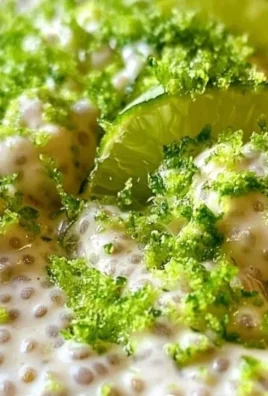 Delicious Key Lime Pie Chia Pudding topped with lime slices and zest