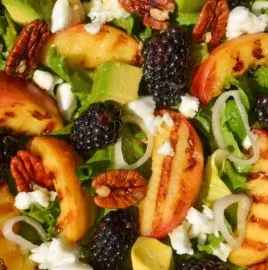 Colorful Peach Salad with fresh ingredients and a vibrant presentation.