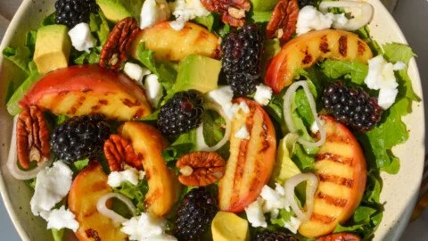 Colorful Peach Salad with fresh ingredients and a vibrant presentation.