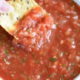 Delicious restaurant-style salsa made with fresh tomatoes, onions, and spices.