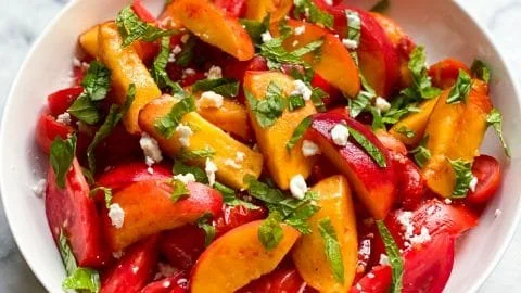 Delicious Summer Tomato Peach Salad with fresh ingredients and vibrant colors