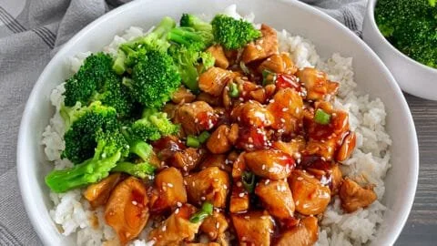Delicious Teriyaki Chicken Rice Bowl with vibrant vegetables and rice.