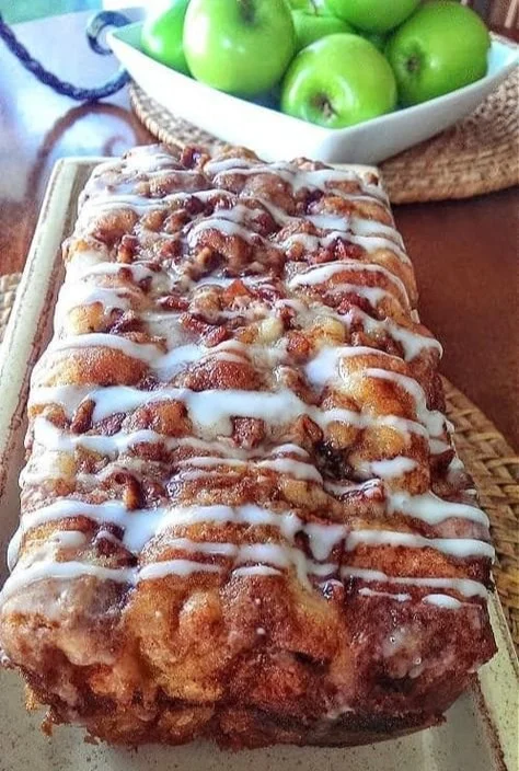 Homemade Apple Fritter Bread sliced and served on a plate