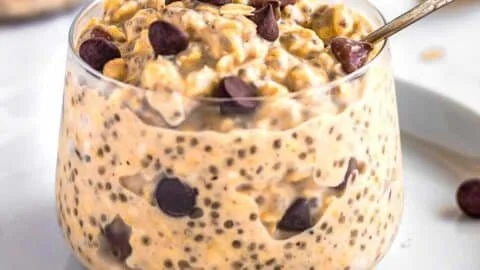 Delicious Cookie Dough Overnight Oats topped with chocolate chips and nuts
