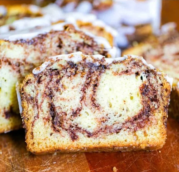 Delicious Country Cinnamon Swirl Buttermilk Loaf on a wooden table